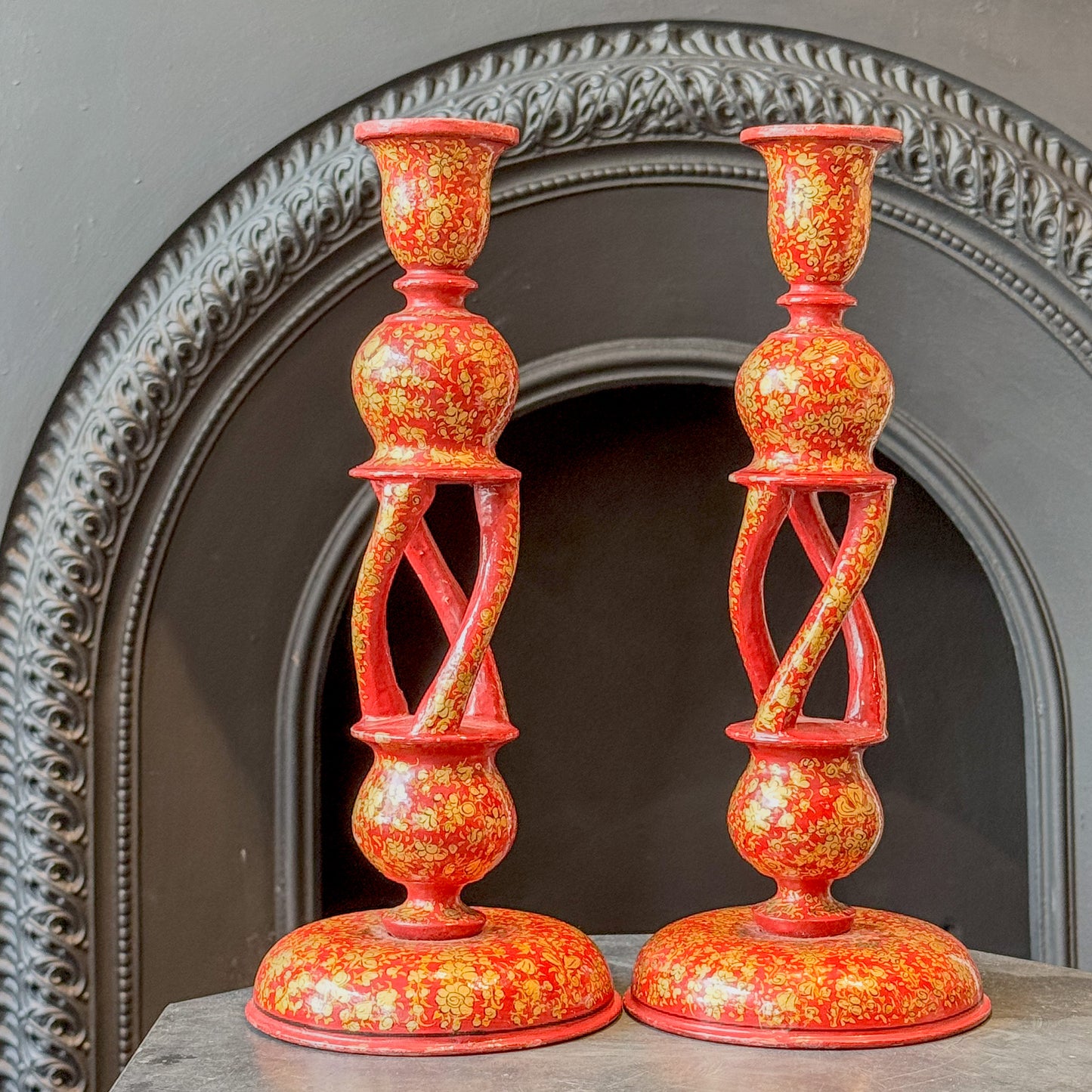 A Pair of Early 20th Century Kashmiri Red Twist Candlesticks
